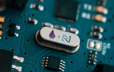 Elixir and Nerves logos on a blue circuit board